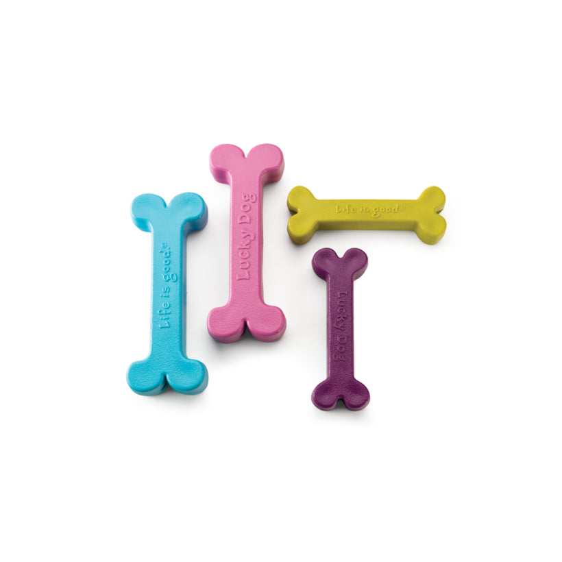 Four multi-flavoured plastic bones for dogs